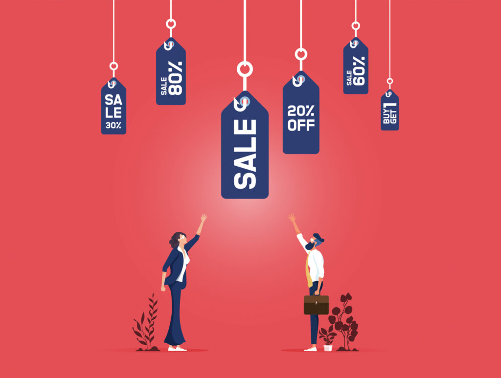 Sale discounts encouraging impulse purchases and spending habits that contribute to the small purchase trap.